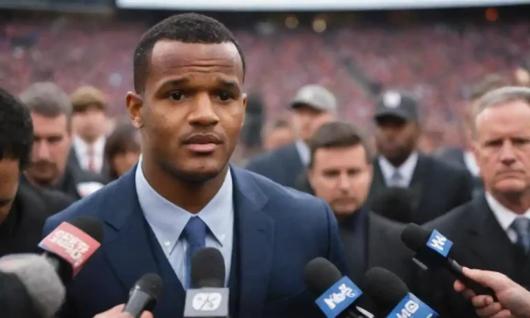 Deshaun Watson speaking to a crowd with a concerned expression