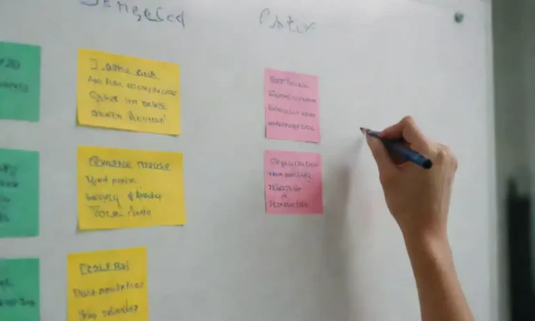 A person filling out a DAFO matrix with strengths